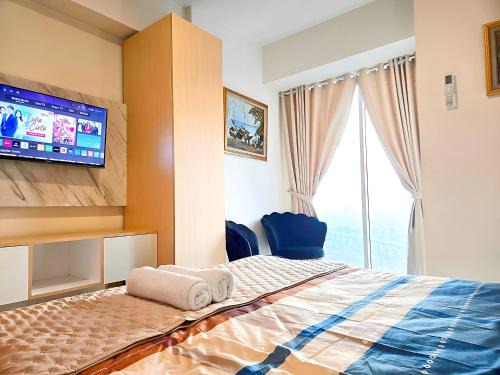 Pekayon Jaya Apartment | Apatermend grand kamala lagoon 1BR Cozy & Elegant by LuckyStay