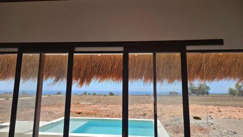 Mamboro Apartment | Beach Padel and Pool Villa Profits to Charity