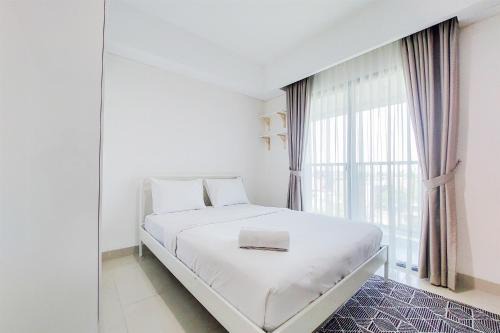 Pondok Aren Apartment | Comfort 1BR without Living Room Bintaro Embarcadero Apartment By Travelio