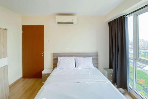 Kayu Putih Apartment | Cozy and Enjoy Living 2BR Tifolia Apartment By Travelio