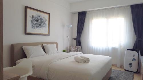 Cileunyi Apartment | Economic Luxurious Studio Pinewood Apartment Jatinangor near JATOS By Travelio