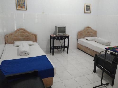 Parepare Hotel | EXPRESS O 91176 Hotel Puri Gandaria