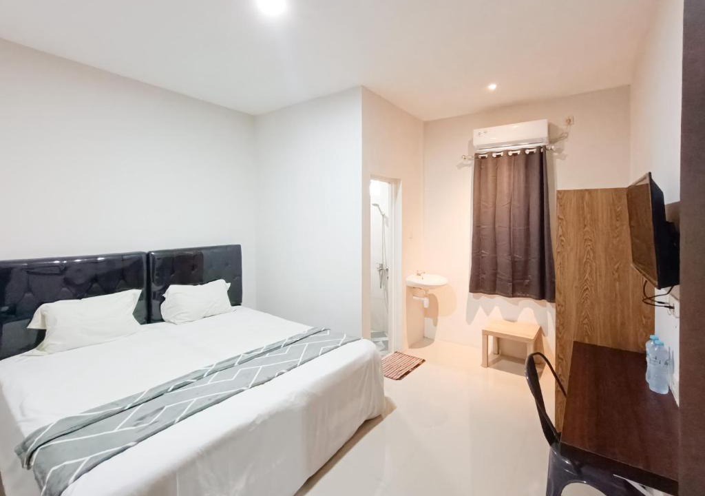 Patrang Hotel | Happy Family Homestay Jember Mitra RedDoorz