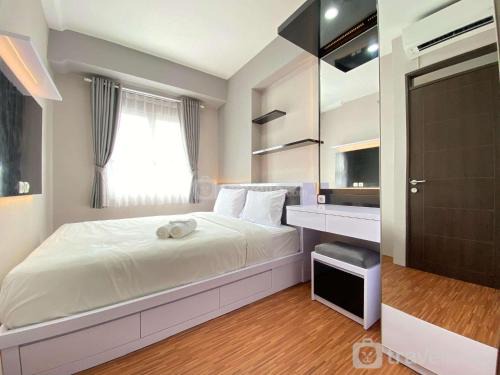 Cibaduyut Apartment | Homey 2BR Apartment at Mekarwangi Square Cibaduyut By Travelio