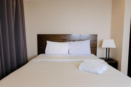 Braga Apartment | Homey and Spacious 3BR Apartment at Braga City Walk By Travelio
