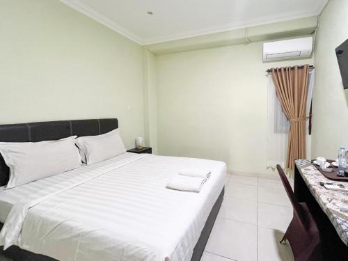 Blitar Hotel | Hotel Permai Syariah RedPartner Sananwetan Blitar