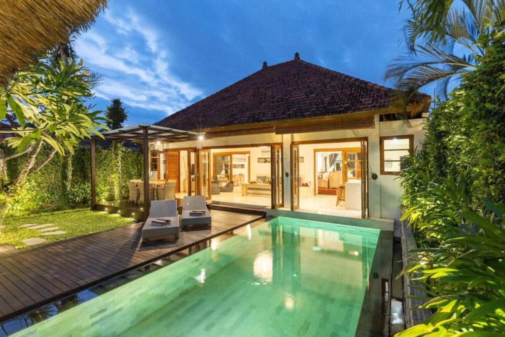 Sunset Road Villa | Luxurious and Cozy King Beds, Pool, closed living room