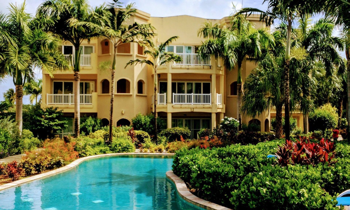 Cotton Ground Condo | “Mango” - Vibrant Villa Yards from BEACH at Hamilton Beach Villas & Spa