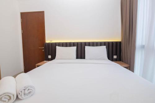 Semanggi Apartment | Minimalist and Homey 1BR at Ciputra World 2 Apartment By Travelio