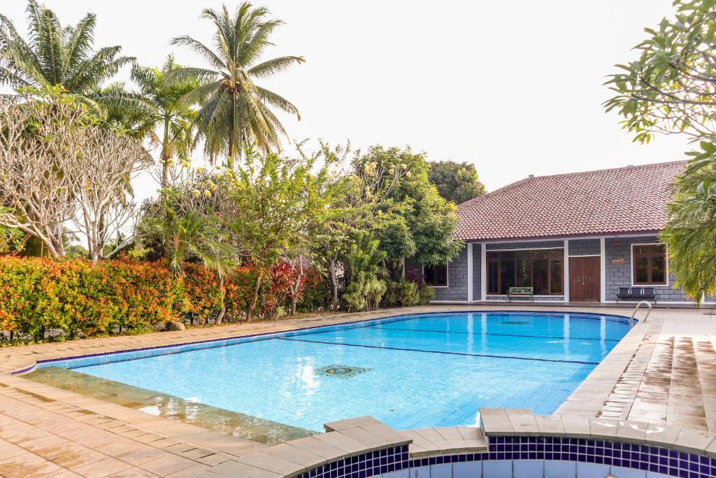 Carita Hotel | OYO 1395 Carita Asri Villas & Resort