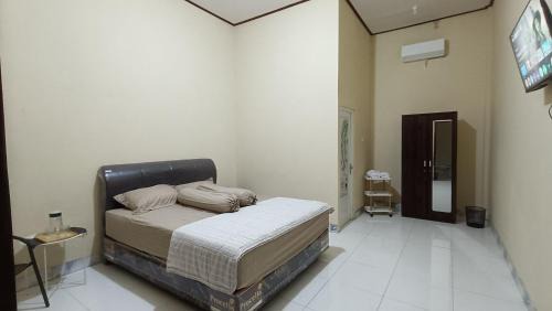 Palangkaraya House | Pink Side Guesthouse