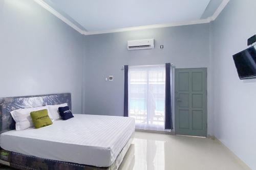 Palangkaraya Hotel | Urbanview Hotel Menteng Jaya GH Palangka Raya