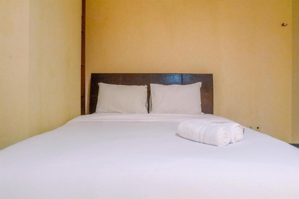 Suko Manunggal Apartment | Very Spacious 3BR High Floor Taman Beverly Apartment By Travelio