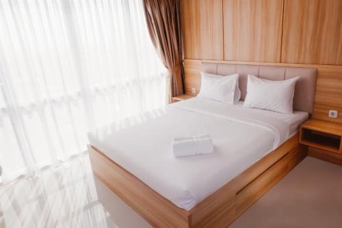 Cawang Apartment | Warm Interior 3BR Apartment H Residence near MT Haryono and Cawang By Travelio