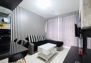 Monochrome 1BR Lexington Apartment By Travelio in Jakarta