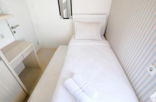Jatinegara Apartment | 2 BR Bassura City Apartment with Mall Access By Travelio