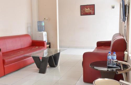 Padang Hotel | Al-Ghani Syariah Mitra RedDoorz