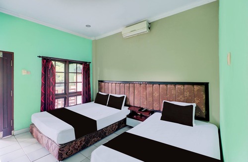 Cokroaminto Hotel | Collection O Bali near Terminal Ubung formerly Batukaru Garden Hotel