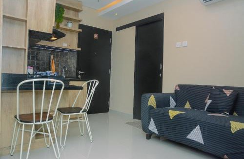 Pondokcina Apartment | Comfortable and Beautiful 1BR Apartment at Atlanta Residence By Travelio