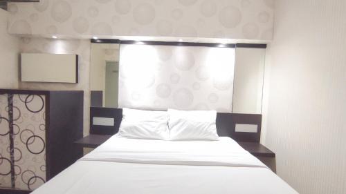 Surabaya Apartment | Comfortable Living 2BR at Dian Regency Apartment By Travelio