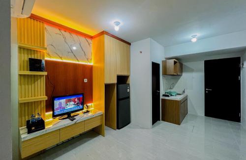 Sidoarjo Apartment | Compact and Relaxing 2BR at Suncity Residence Apartment By Travelio