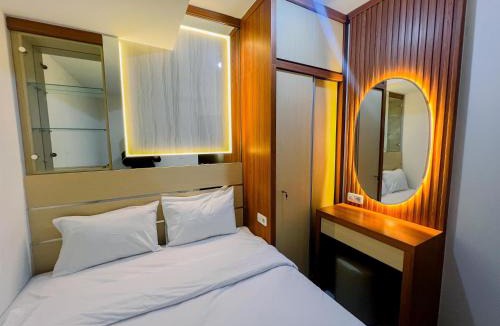 Sidoarjo Apartment | Compact and Relaxing 2BR at Suncity Residence Apartment By Travelio