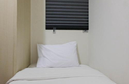 Pagedangan Apartment | Convenient and Luxurious 2BR Asatti Apartment By Travelio
