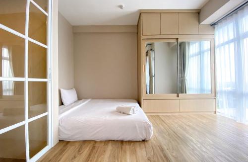 Cikarang Apartment | Cozy and Simple Big Studio Vasanta Innopark Apartment By Travelio