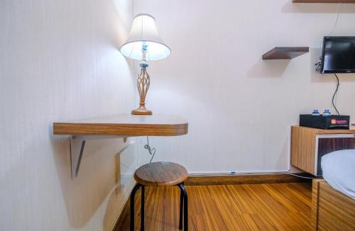 Depok Apartment | Cozy and Simple Living Studio Apartment at Cinere Resort By Travelio