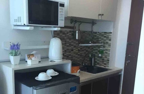 Kayu Putih Apartment | Cozy Modern Studio Room at Tifolia Apartmemt
