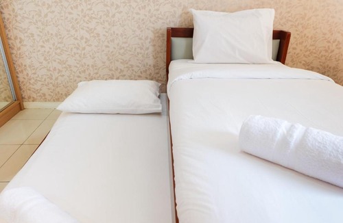 Sunter Apartment | Cozy Studio Green Lake Sunter Apartment By Travelio
