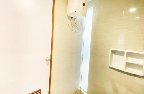 Malabar Apartment | Cozy Studio Room at Green Kosambi Bandung Apartment By Travelio