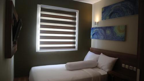 Palmerah Hostel | DJURAGAN KAMAR SLIPI