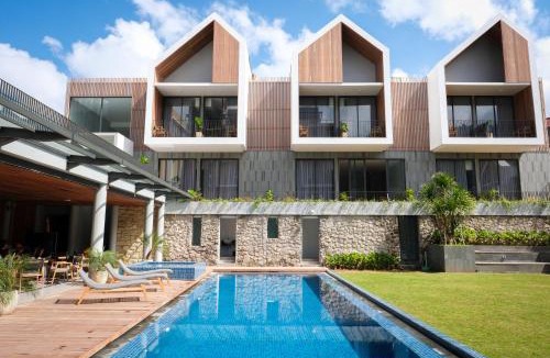 Hargomulyo Hotel | Facade Hotel by Azana