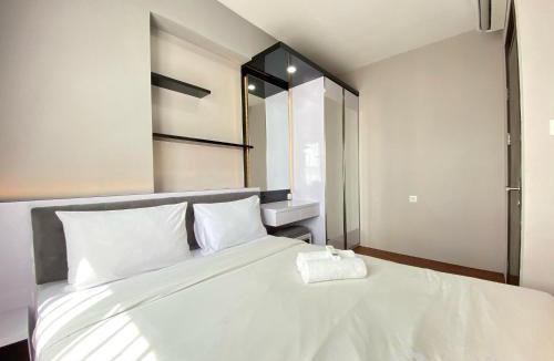 Cibaduyut Apartment | Homey 2BR Apartment at Mekarwangi Square Cibaduyut By Travelio