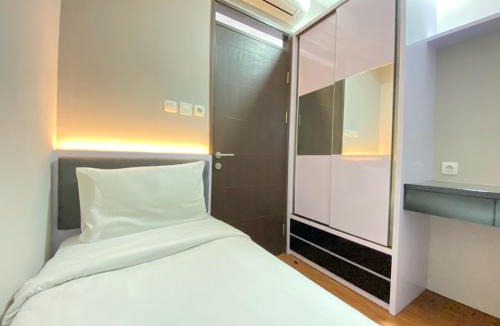 Cibaduyut Apartment | Homey 2BR Apartment at Mekarwangi Square Cibaduyut By Travelio