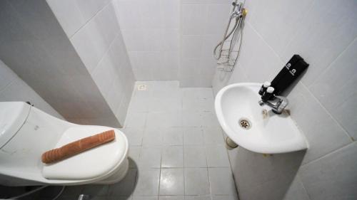 Surabaya Apartment | Homey and Comfy 2BR at Dian Regency Apartment By Travelio