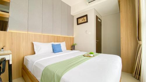 Ciputat Apartment | Homey and Good Place 2BR Transpark Bintaro Apartment By Travelio