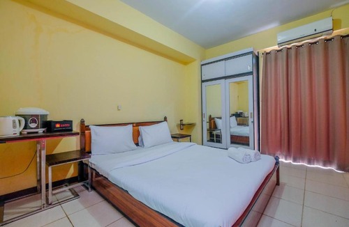 Bogor Apartment | Homey Studio Apartment with Pool View at Bogor Valley By Travelio