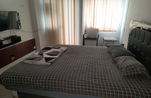 Karawang Hotel | Hotel O Apartemen Grand Sentraland by Mira