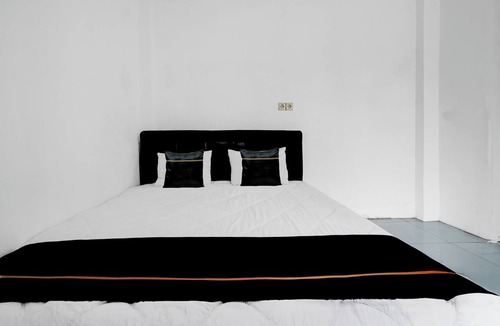 Beji Hotel | Hotel O near Jatim Park 3 formerly Srikandi Residence