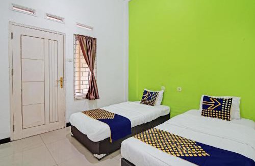 Pekanbaru Hotel | Hotel O Penginapan Puti SyariahNearBandara Sultan Syarif Kasim II