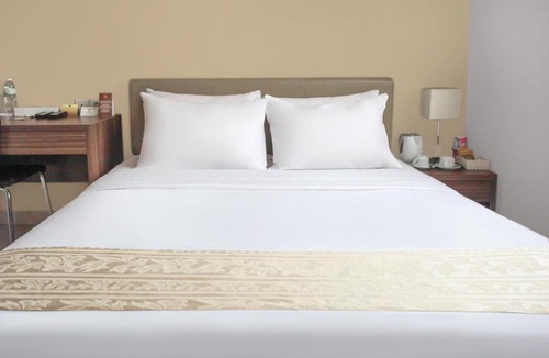 Bendungan Hilir House | LeGreen Suite Gatot Subroto