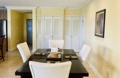 Cotton Ground Condo | “Mango” - Vibrant Villa Yards from BEACH at Hamilton Beach Villas & Spa