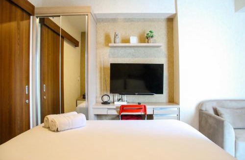 Bekasi Barat Apartment | Minimalist and Comfy 1BR Grand Kamala Lagoon Apartment By Travelio