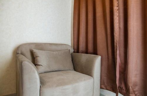 Bekasi Barat Apartment | Minimalist and Comfy 1BR Grand Kamala Lagoon Apartment By Travelio