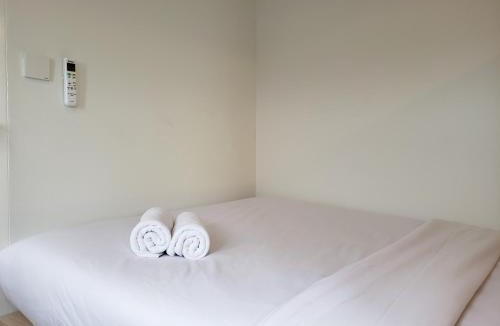 Lenteng Agung Apartment | Minimalist and Cozy 2BR at La Hub City Apartment By Travelio
