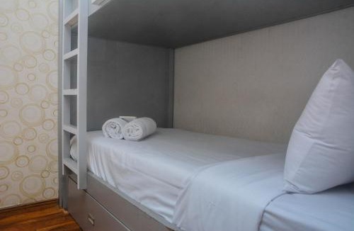 Jatinegara Apartment | Minimalist and Warm 2BR at Bassura City Apartment By Travelio