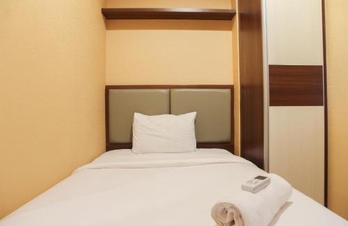 Bekasi Barat Apartment | Modern 2BR Grand kamala Lagoon Apartment By Travelio