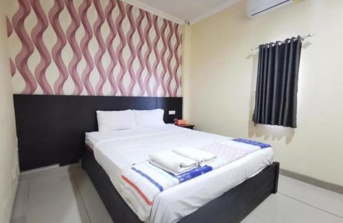 Sangatta Utara Hotel | OYO 95059 Ikon Guesthouse